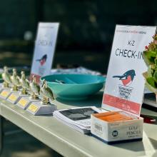 Big Day Boston Check in table with trophies